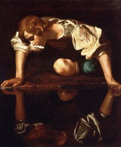 Pintura de Caravaggio que retrata Narciso a olhar para o seu reflexo no lago